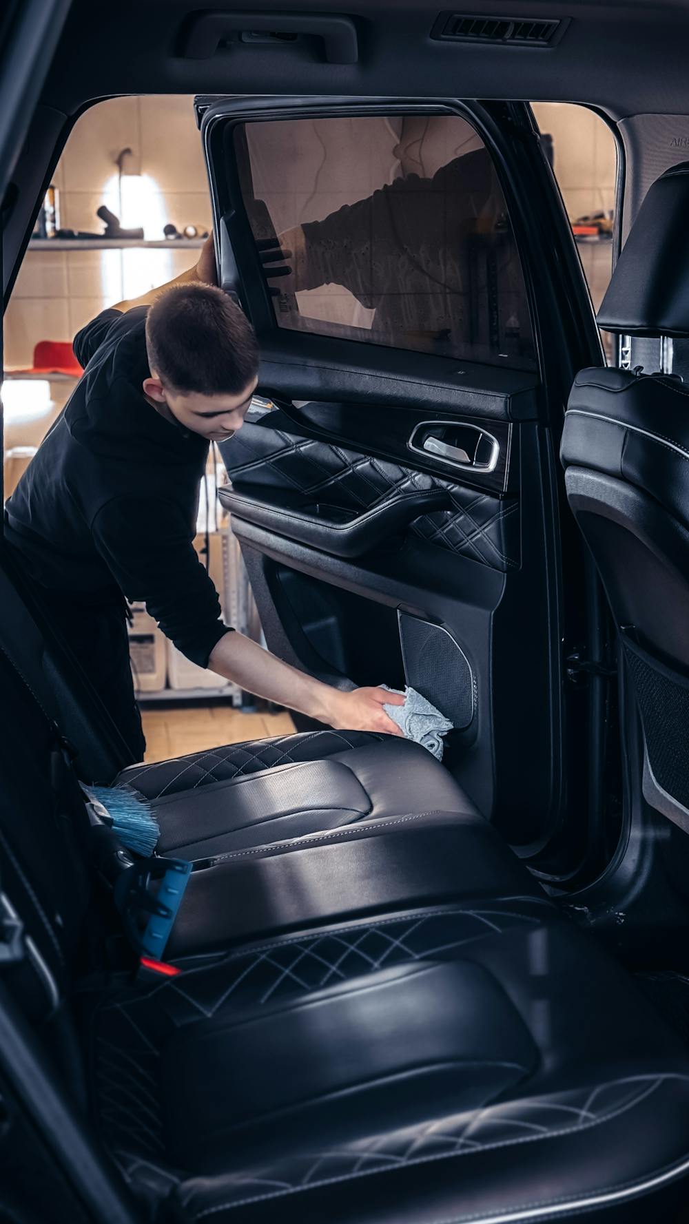 Interior car dusting and wipe-down for seats and door panels