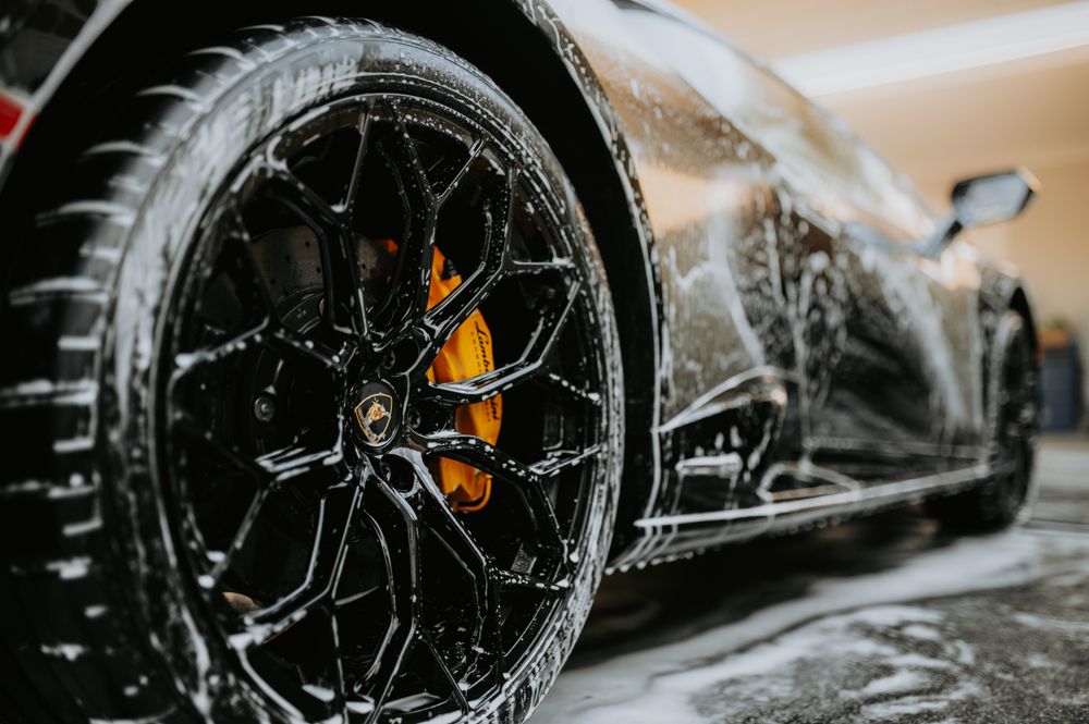 Tyre and alloy wheel being cleaned for a crisp finish
